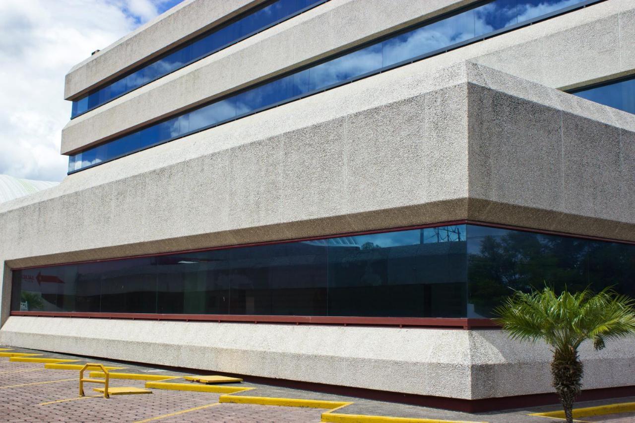 San Juan Park Hotel San Juan del Río Exterior foto The headquarters of the National Institute of Statistics of El Salvador.